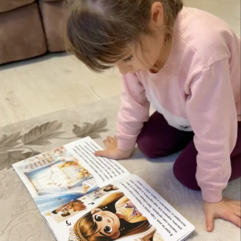 A child reading a personalized storybook