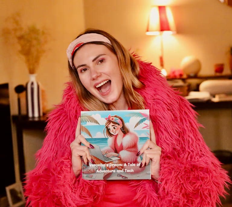 A child smiling with a personalized book